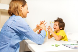 child in his first physical therapy visit child in his first physical therapy visit